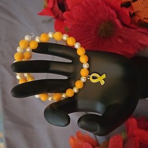NWOT Yellow Ribbon Charm Memory Wired Bracelet  -  1004